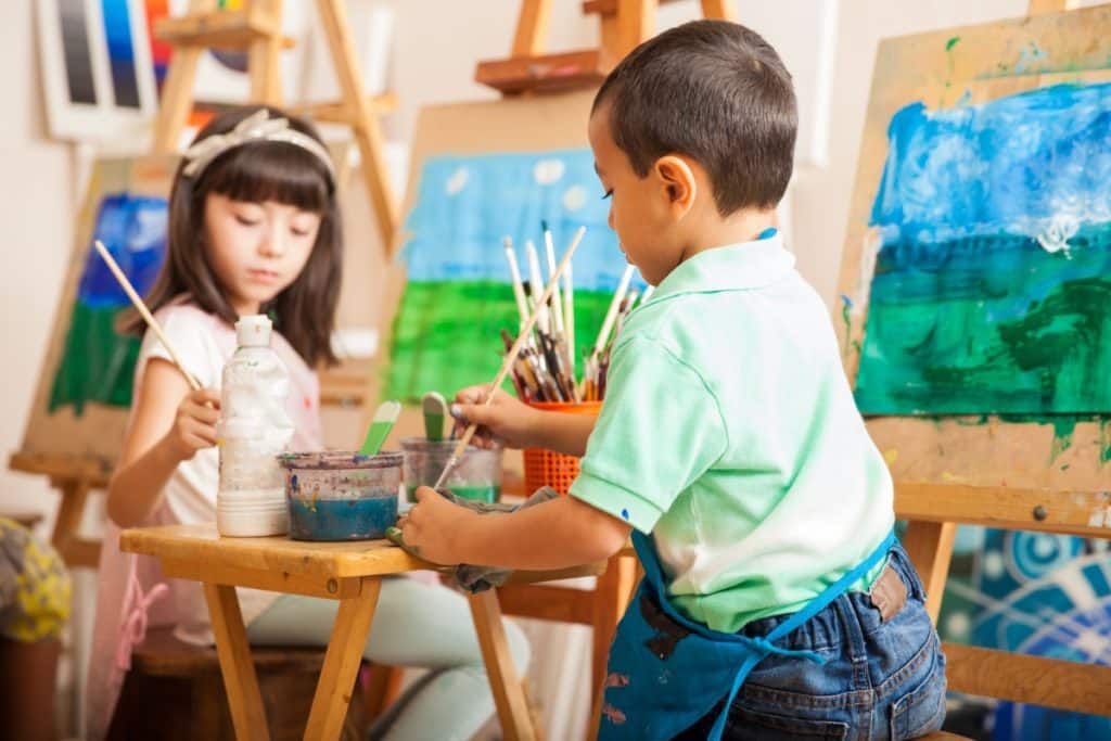 Kids painting in an art class