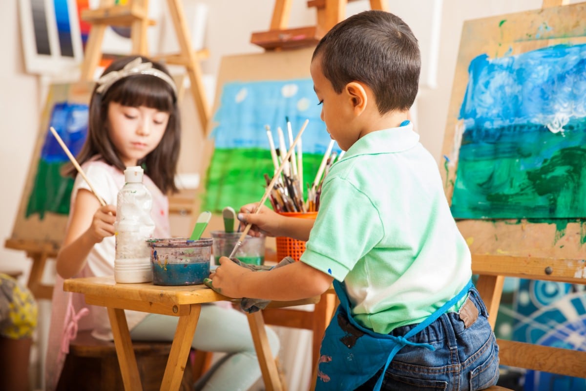 Kids painting in an art class