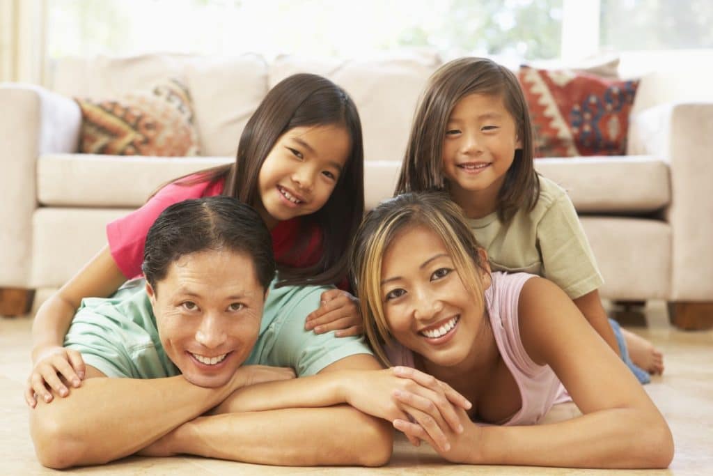A happy family in their home